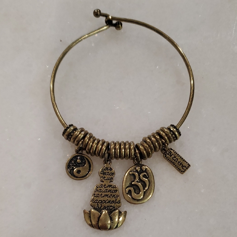 Elegant Gold Charm Bracelet with Spiritual Symbols